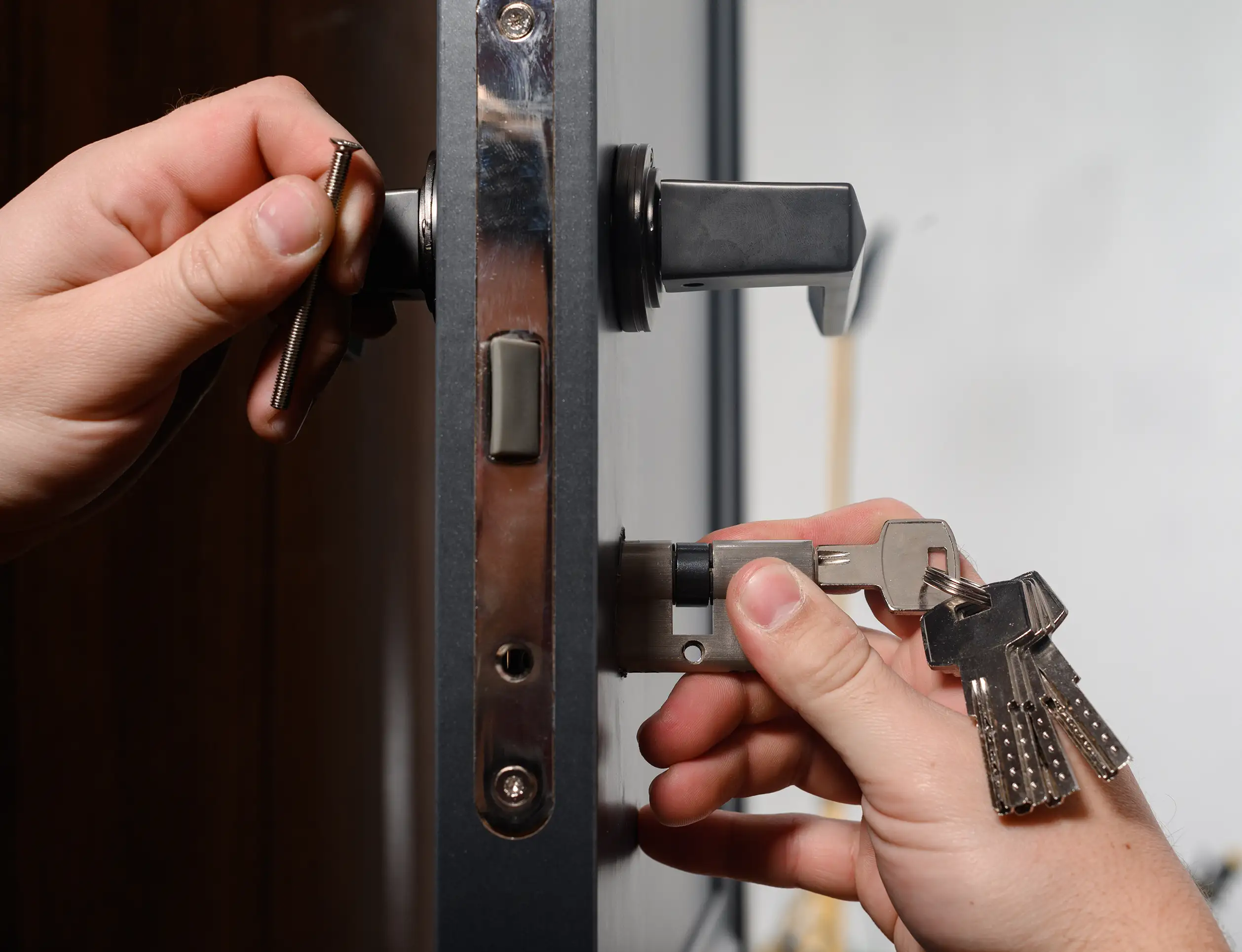 Standard Door Lock being changed by Mobile Locksmith Technician