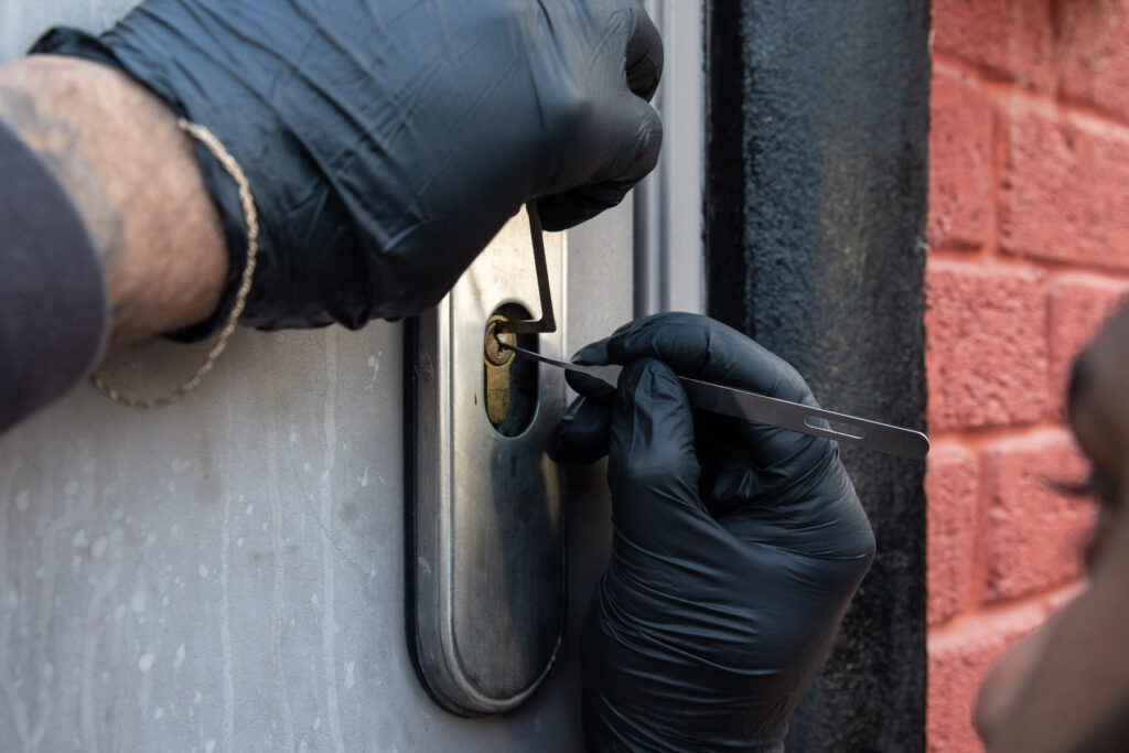 Commercial door lock being picked for non-destructive entry as part of a mobile service provided by AH Locktech